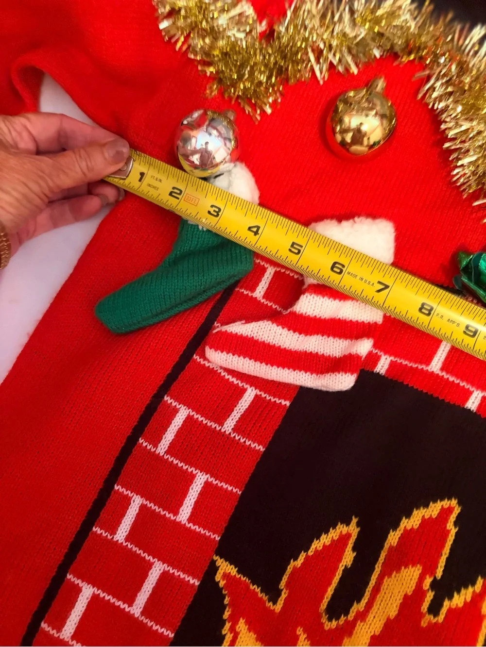 Red Holiday Fireplace Sweater with Tinsel and Stockings
